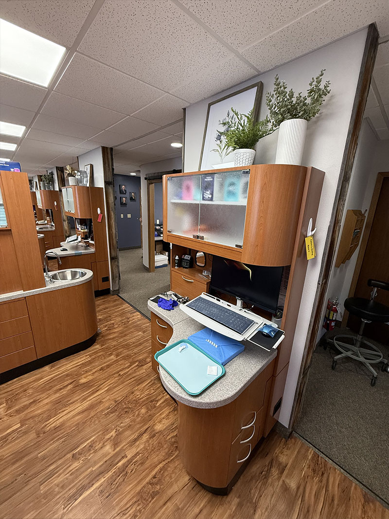 A professional dental office with modern equipment and a clean, organized appearance.